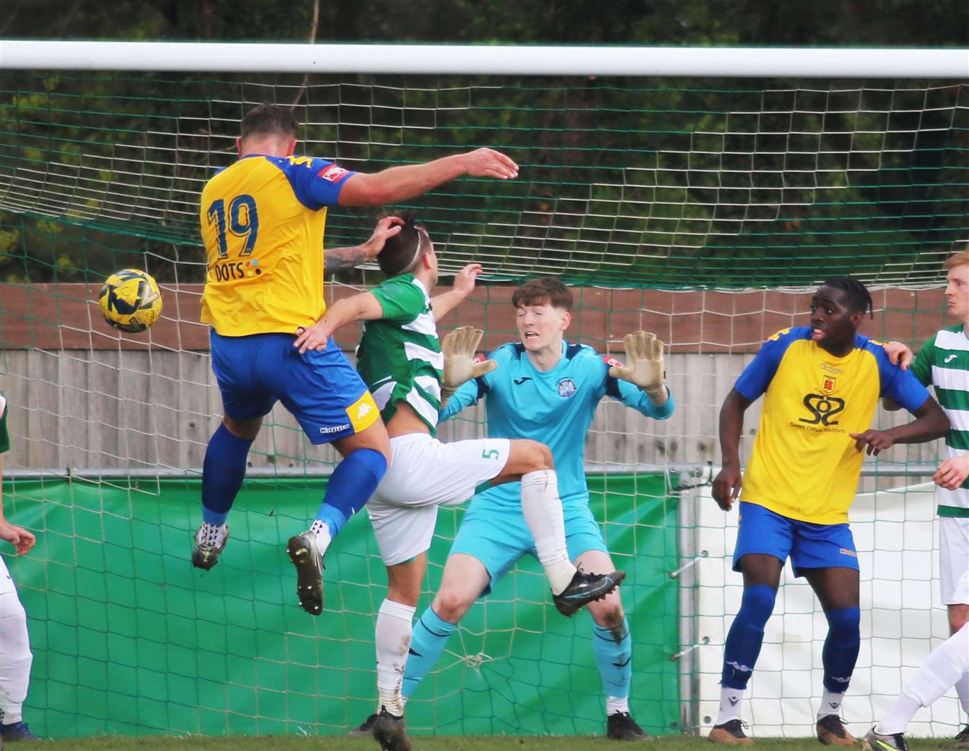 Darren Phillips heads past Corinthian keeper Daniel Colmer on 31 minutes in Faversham's 2-0 victory. Picture: Paul Willmott