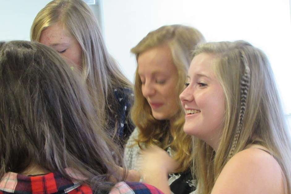 Pupils open their A-level results. Library image.