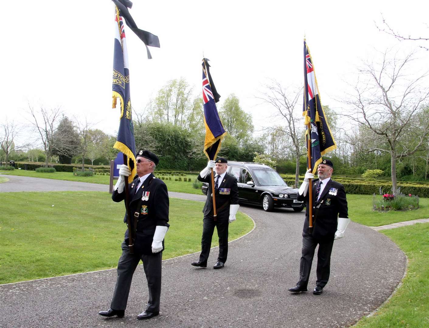 RBI Standard Beaters escort Mick Bingham's cortege on arrival at the Garden of England Crematorium, Bobbing. Picture: Roger Vaughan