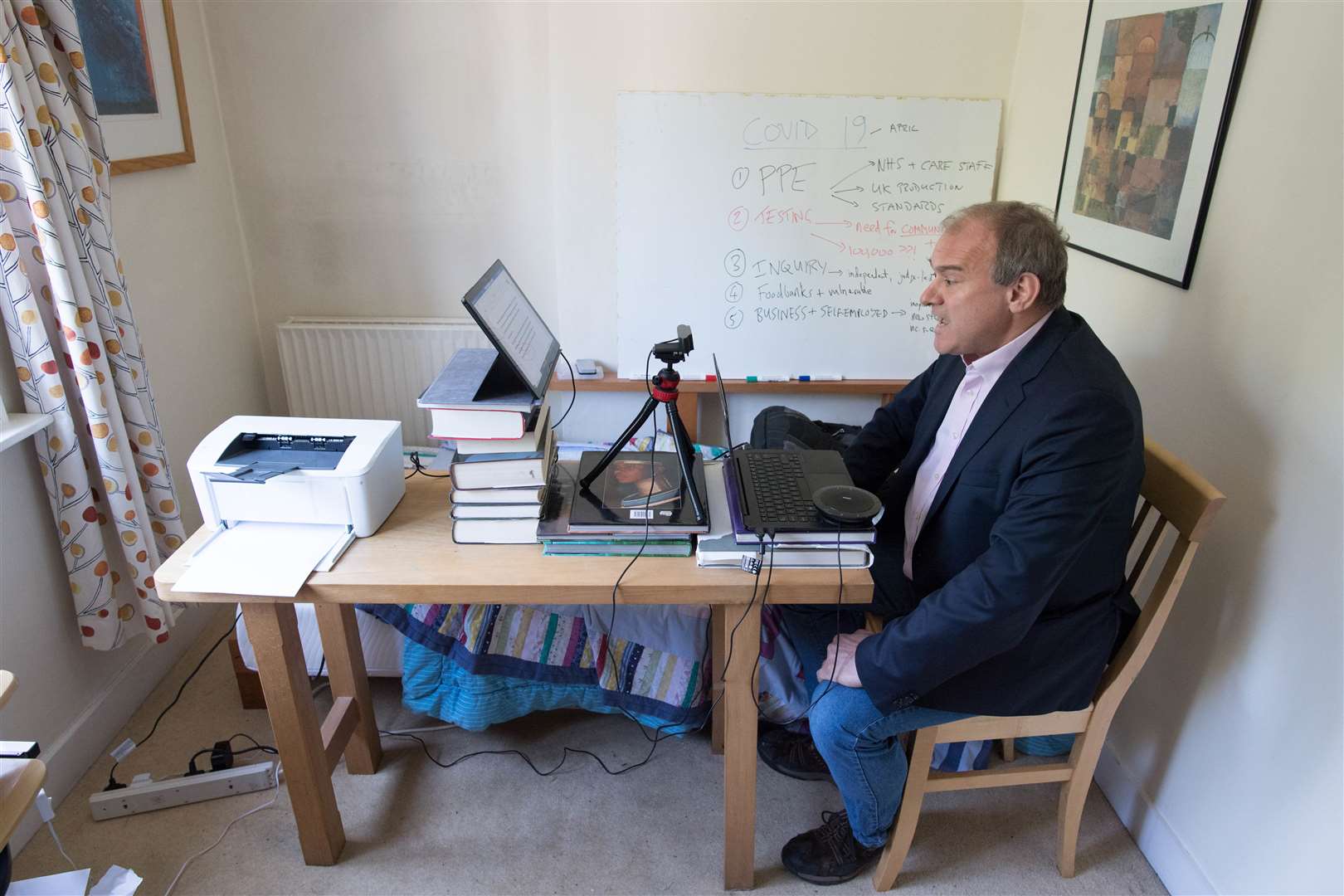 Liberal Democrat leader Sir Ed Davey takes part in the Prime Minister’s Questions from his home in Surbiton, south London (Stefan Rousseau/PA)