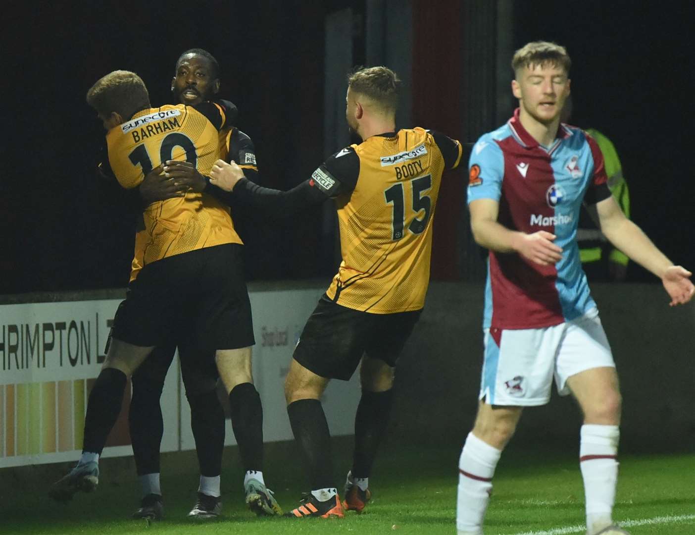 Jack Barham celebrates with Roarie Deacon and Regan Booty after giving Maidstone the lead at Scunthorpe. Picture: Steve Terrell