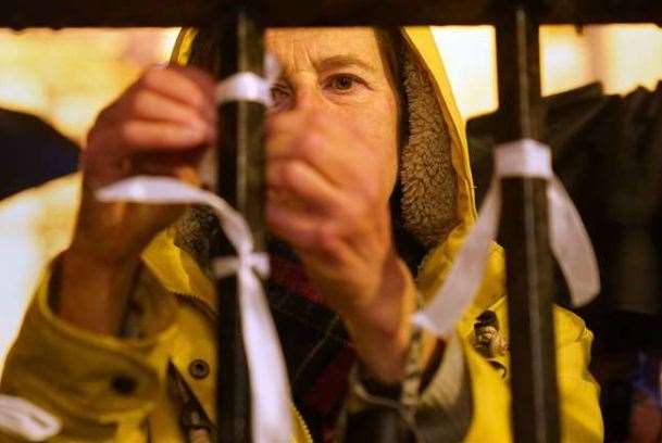 A ribbon is attached to a railing at Canterbury Cathedral during the vigil. Picture: Gareth Fuller/ PA