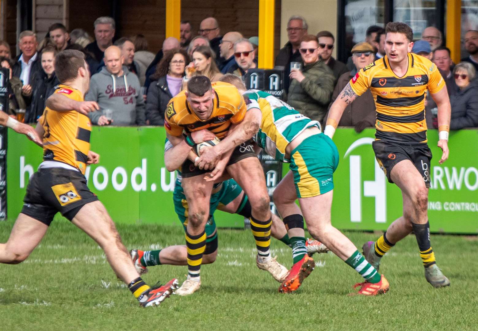 Canterbury’s Frank Morgan stands his ground against a Guernsey challenge. Picture: Phillipa Hilton