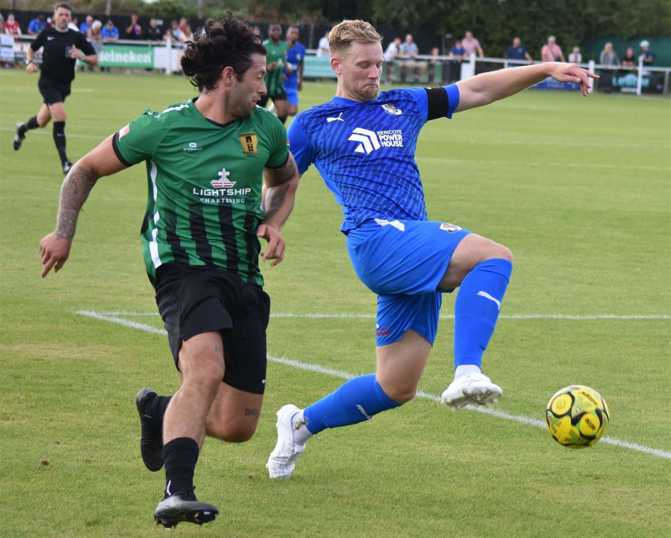 Dartford captain Josh Hill holds off Cray Valley’s Freddie Parker. Picture: Alan Coomes