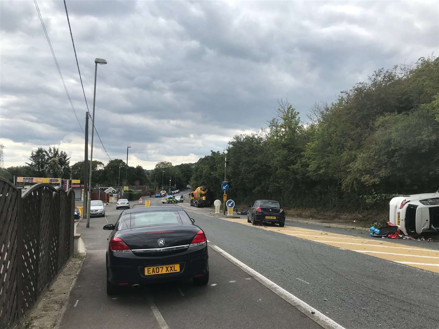 The vehicles were in a queue at traffic lights waiting to go through a section of roadworks