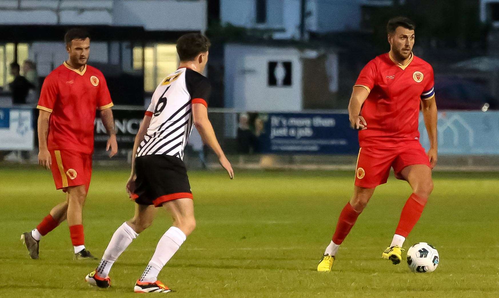 Robbie Dunn and Whitstable captain Jake McIntyre in action. Picture: Les Biggs