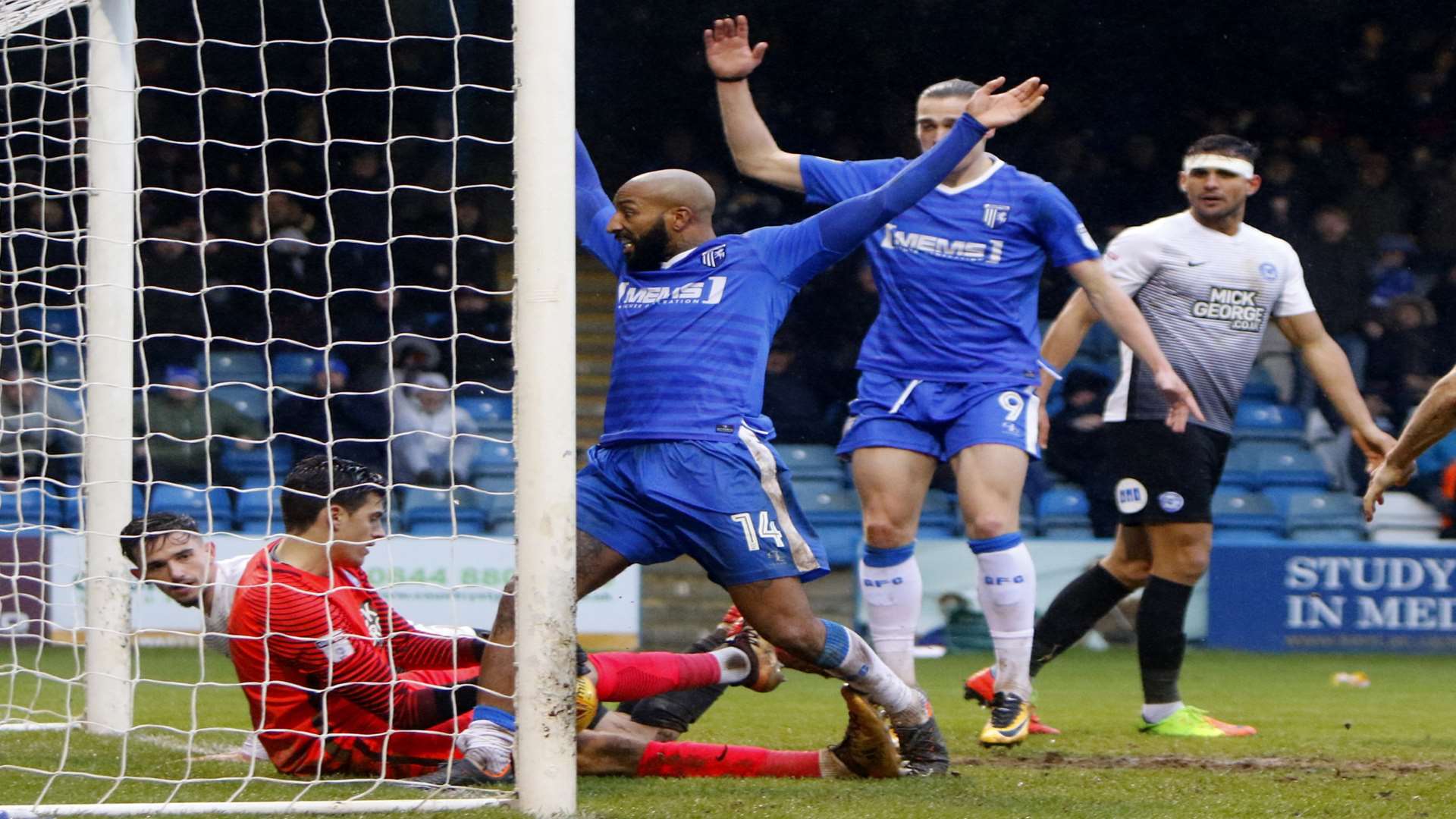 Gillingham's Josh Parker claims his second-half effort has crossed the line. Picture: Andy Jones