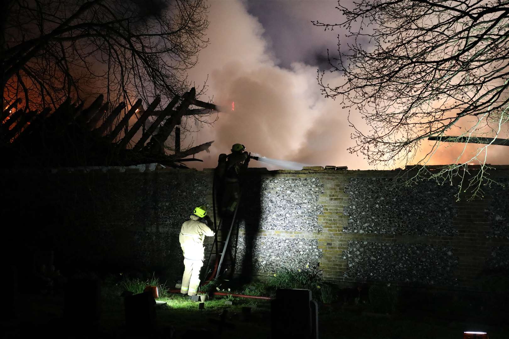 Firefighters battled a roof blaze in a property near Farningham High Street on Saturday night. Picture by Ben Dzierzek