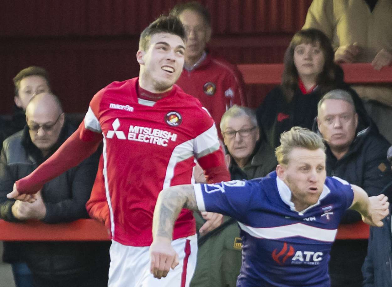 Bryan van den Bogaert wins this header against Margate's Lewis Taylor Picture: Andy Payton