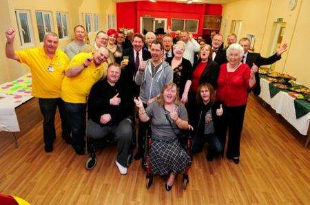 Theresa Langworthy, front, with her committee and others toasting the refurbishment