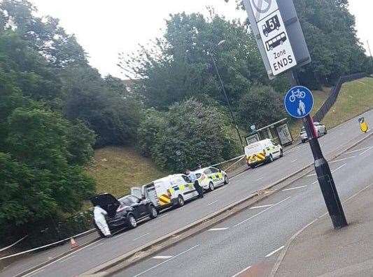 Police in Dock Road, Chatham, following the attack