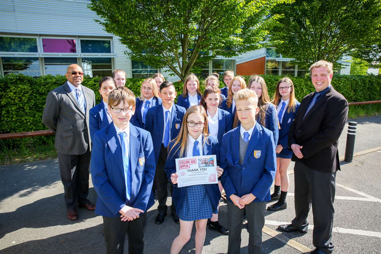 Students from the school council with teachers Phil Neve and Moses Mushekwa