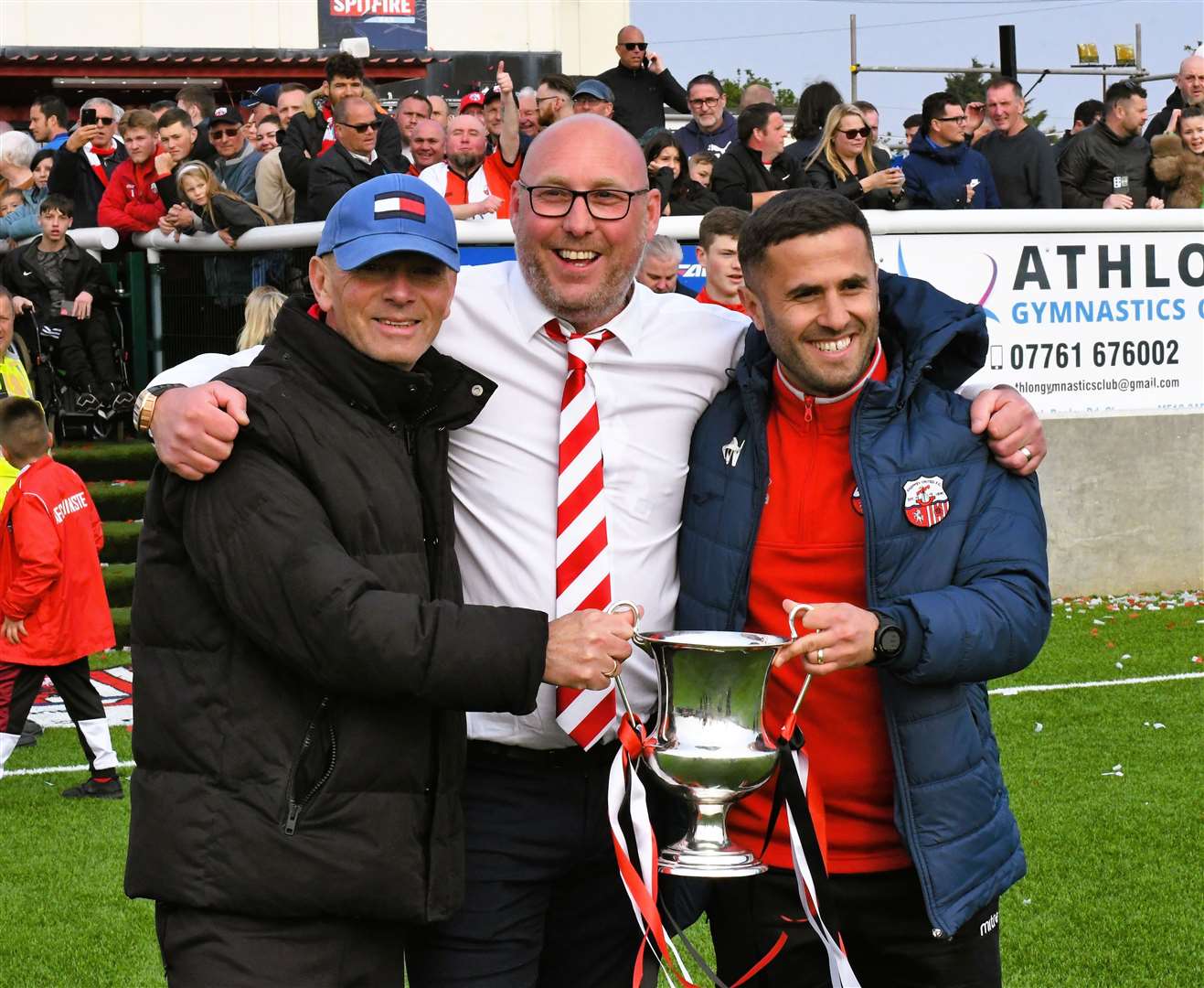 Ernie Batten, Matt Smith and Marcel Nimani with the Southern Counties East trophy, part of the club’s historic quaduple. Picture: Marc Richards