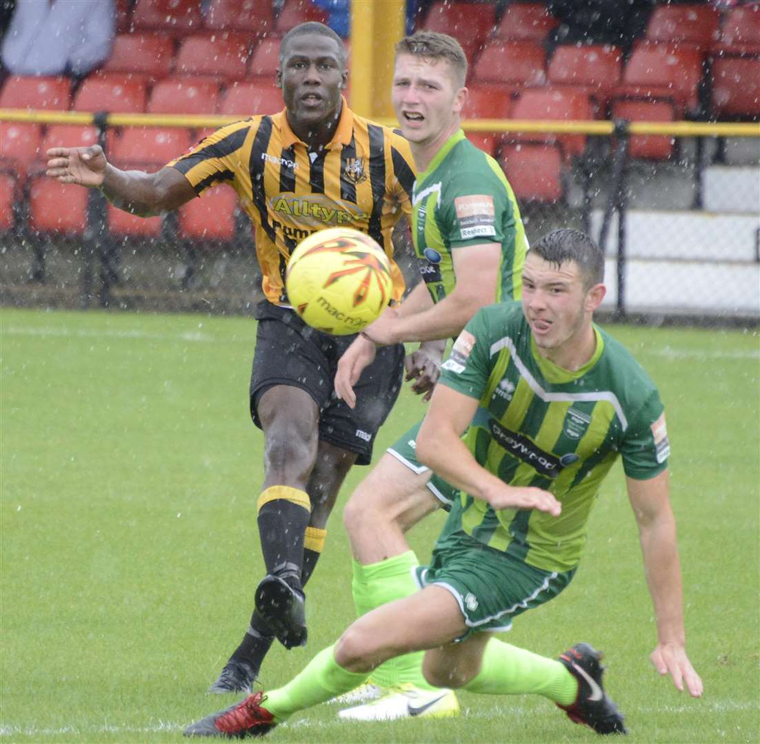 Joe Denny throws himself into a challenge while playing for Thamesmead at Folkestone. Picture: Paul Amos