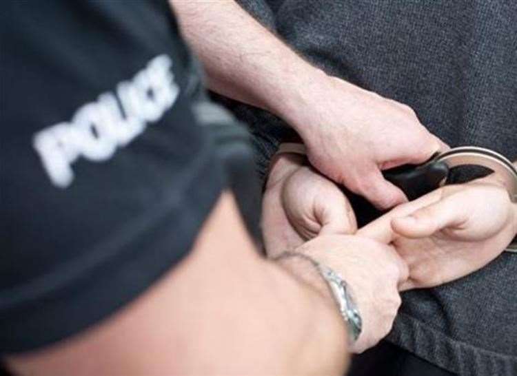 Police arrested him after finding a knife and drugs. Stock photo