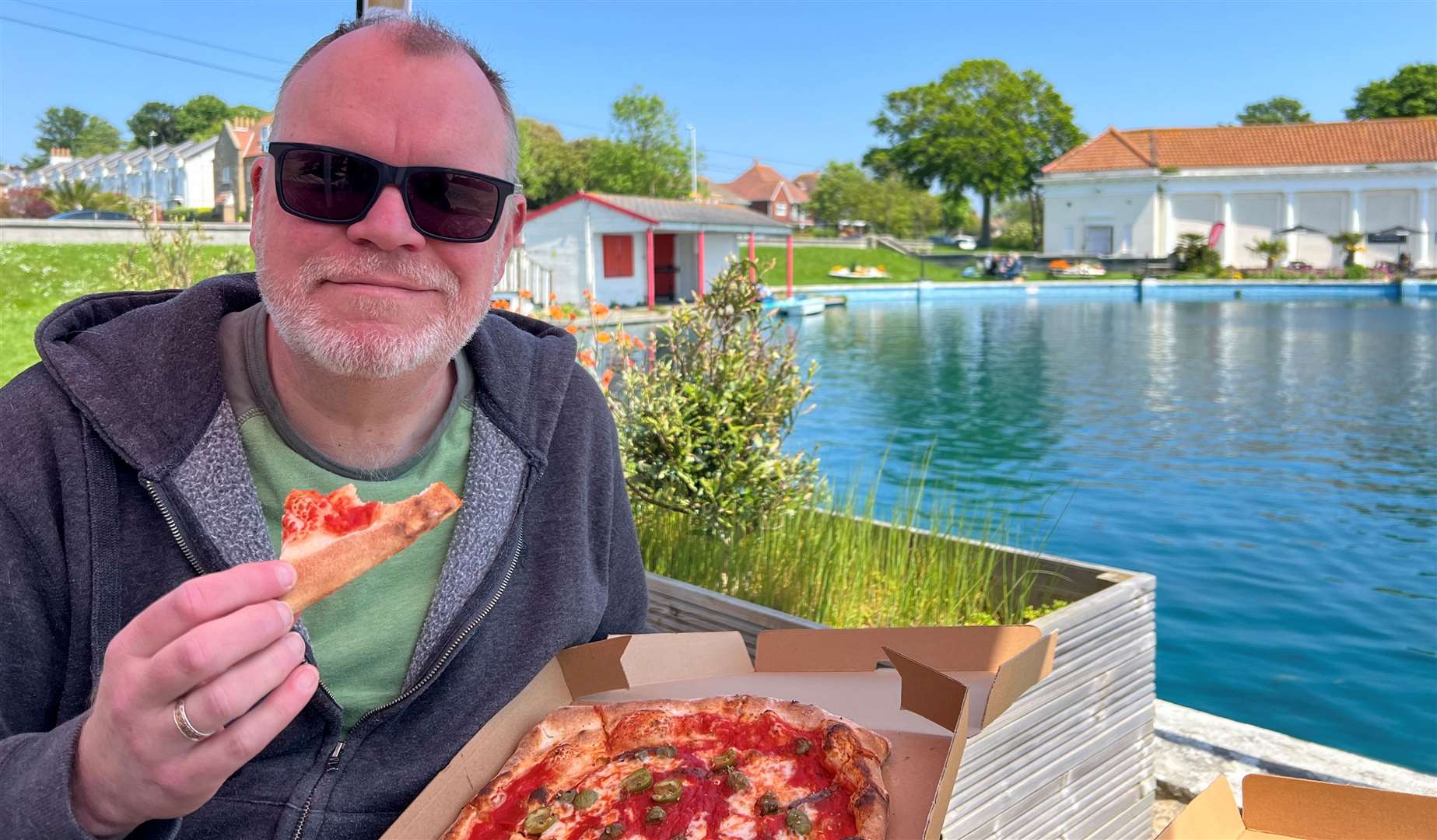 Chris Britcher gets up close and personal with a slice of pizza at the beautiful Ramsgate Boating Pool