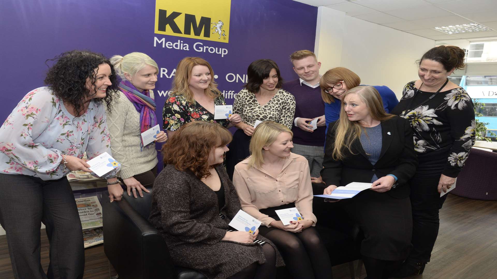 KM staff with Denise Wilton, right front, of the Alzheimer's Society at the Dementia Friends session