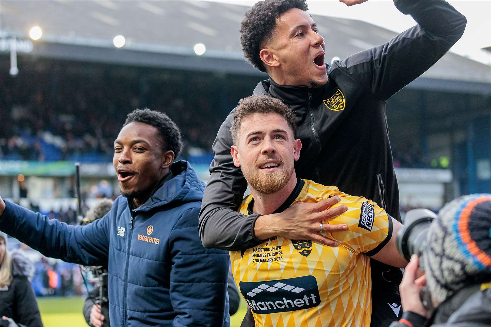 Sam Bone celebrates Maidstone’s FA Cup fourth-round win at Ipswich with Sol Wanjau-Smith and Raphe Brown. Picture: Helen Cooper