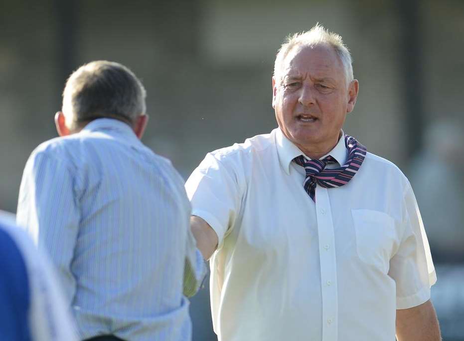 Neil Cugley shakes Terry Brown's hand after the FA Cup tie between Folkestone Invicta and Margate Picture: Gary Browne