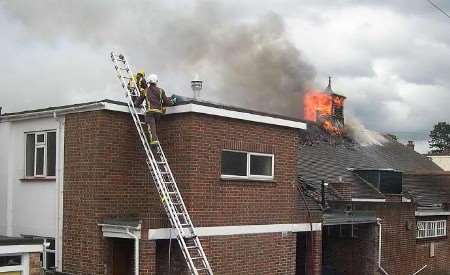 Firefighters in action at the height of the blaze. Picture: Janet Macdonald