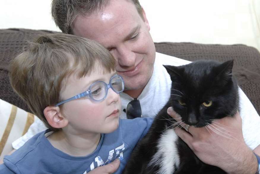 Richard Freeman and son Ewan, four, with Tibbs