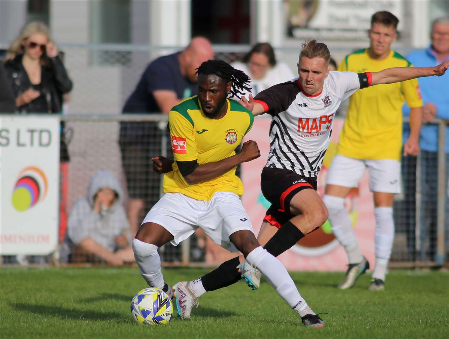 Deal's Ben Chapman and Ahmed Salim Futa, of Corinthian, battle in midfield. Picture: Paul Willmott