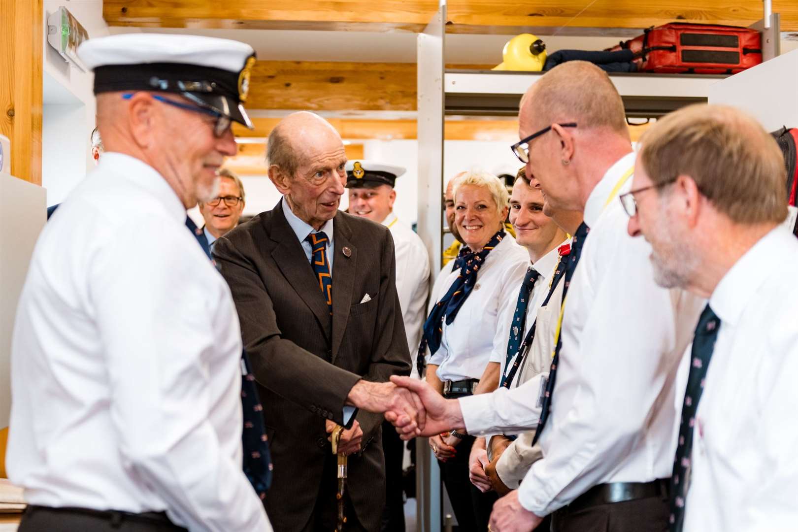 The Duke of Kent being introduced to the operational crew by launch authority and former coxswain Jon Miell at Dover RNLI's lifeboat station. Picture: Dover Media Group