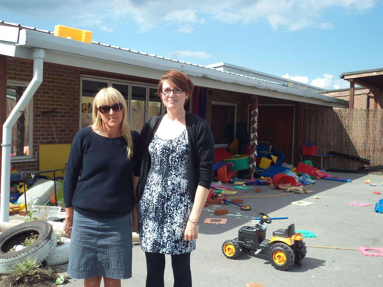 Bernadette Lax and Reception teacher Jess Bishop survey the damage