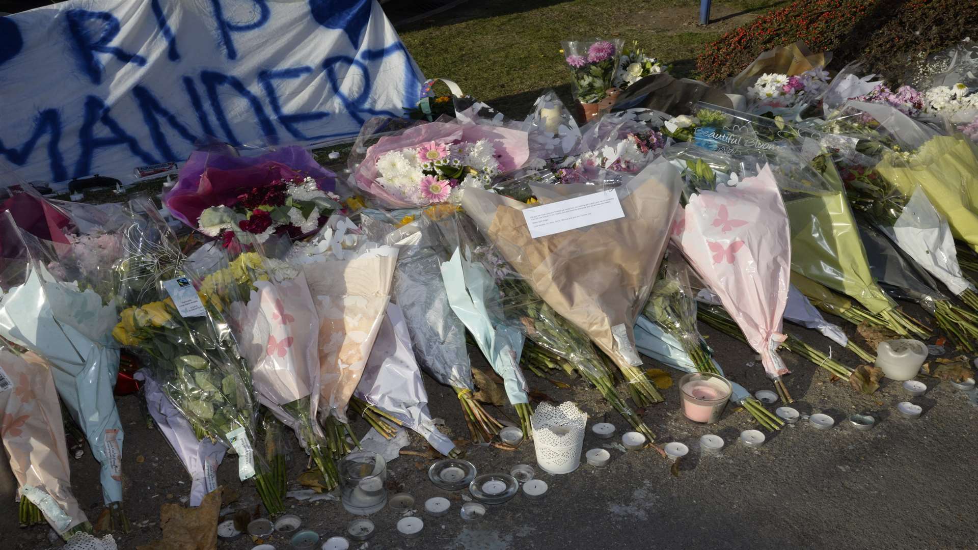 Floral tributes to Jack Mander in Anthony's Way, Strood