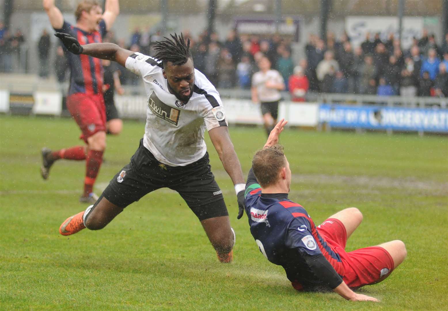 Duane Ofori-Acheampong takes a tumble Picture: Steve Crispe