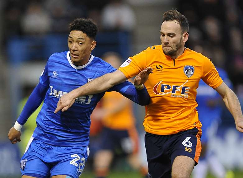 Sean Clare chasing the ball for Gillingham Picture: Ady Kerry