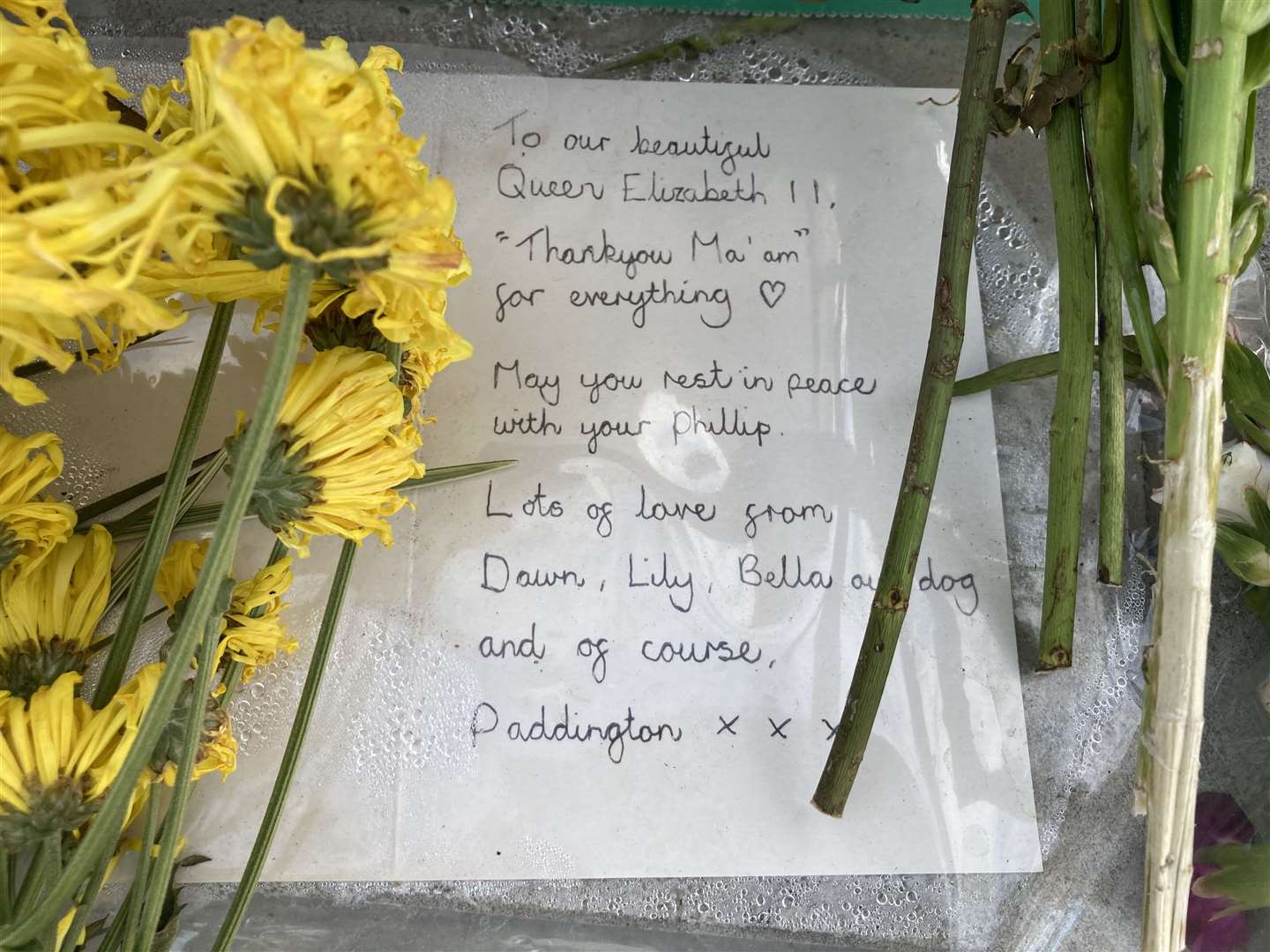 Floral tributes left at the base of the war memorial in Sheerness to mark the death of The Queen. Picture: John Nurden