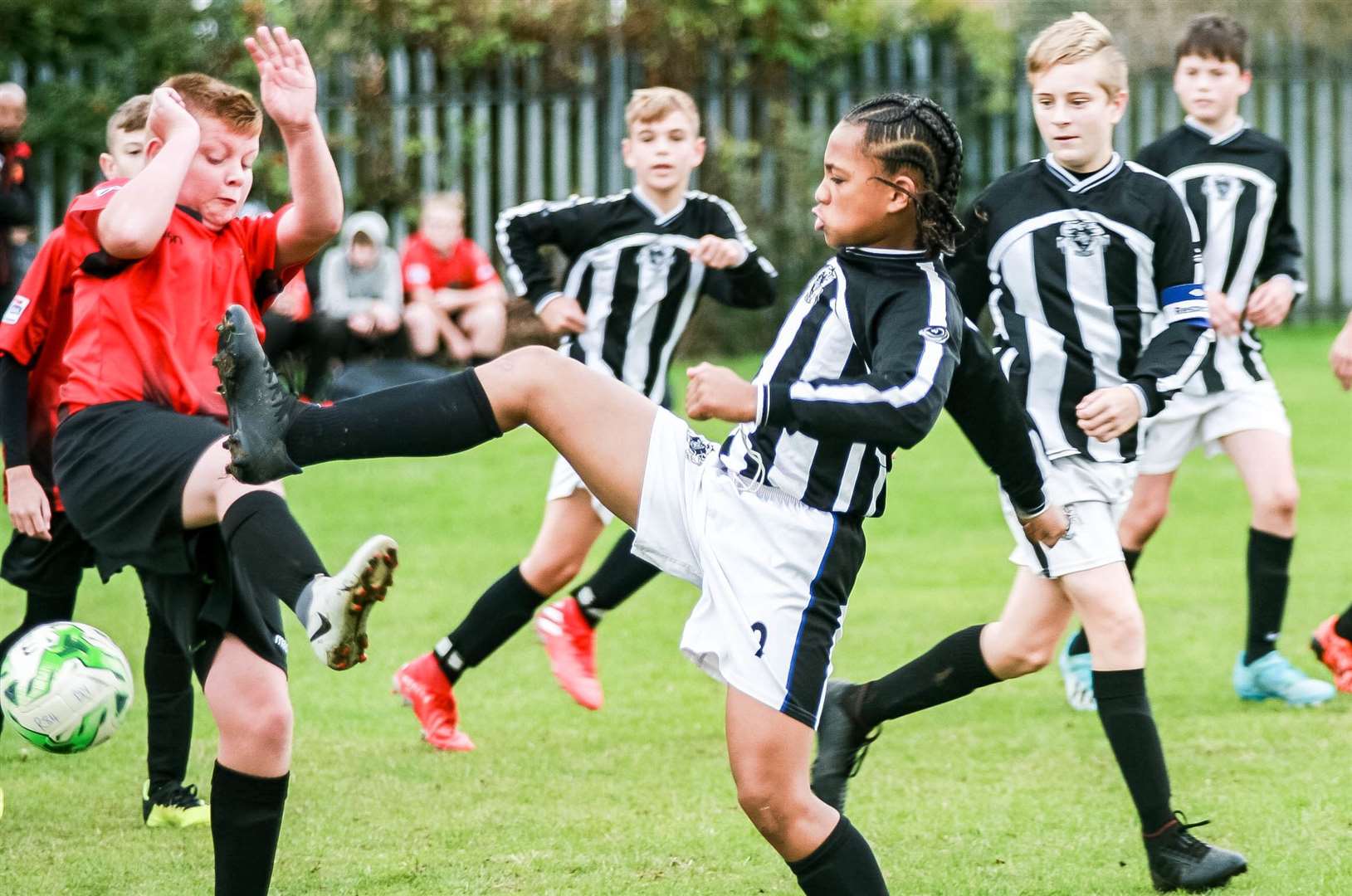 Milton & Fulston United under-14s (black/white) challenge against Rainham 84 Warriors under-14s Picture: Phil Lee FM19227328