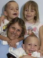 SURVIVORS: Janet Steele and her triplets