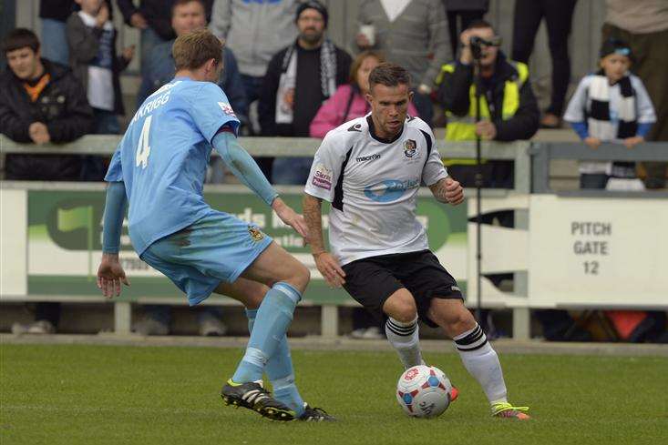 Goalscorer Adam Birchall takes on Steve Akrigg (Pic: Andy Payton)