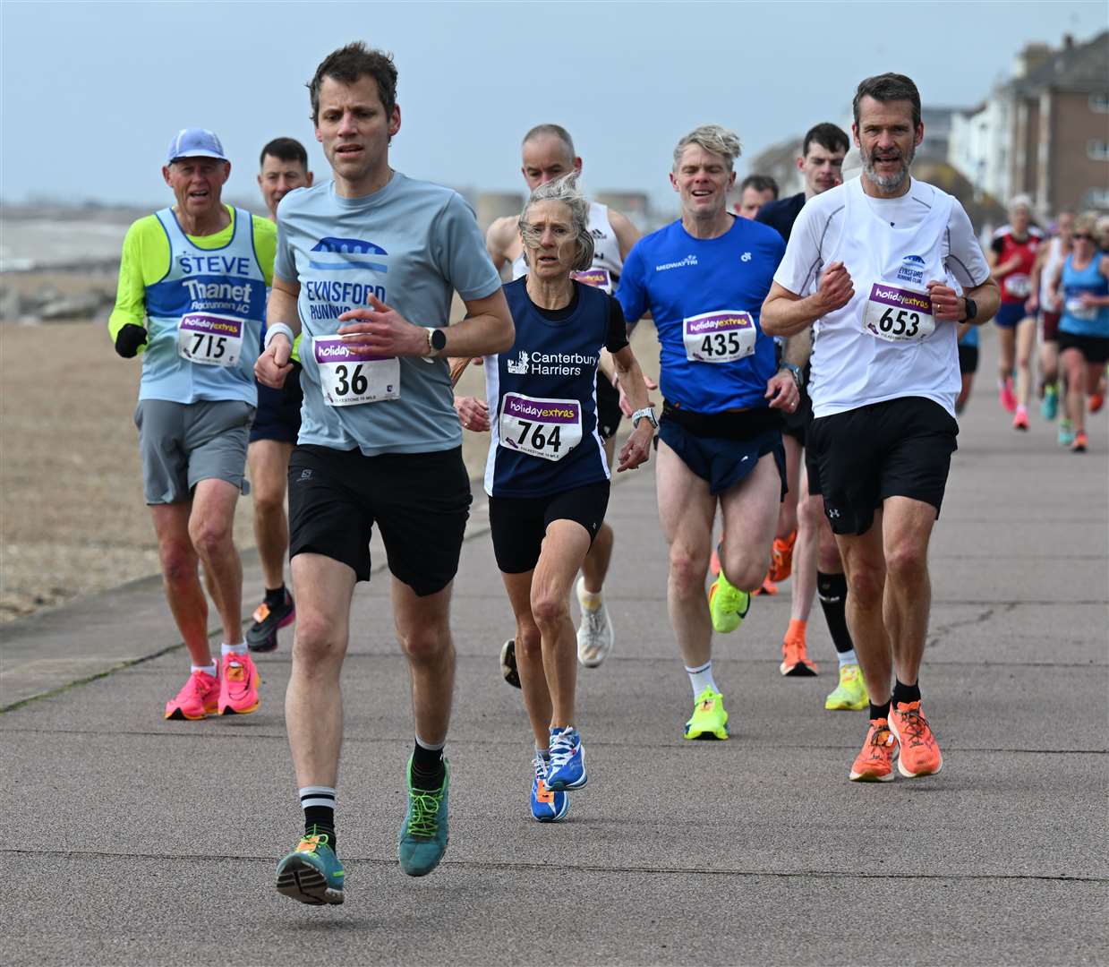 Andrew Baranowski of Eynsford Running Club, chased by Canterbury Harriers' Barbara Wenman (No.764). Picture: Barry Goodwin