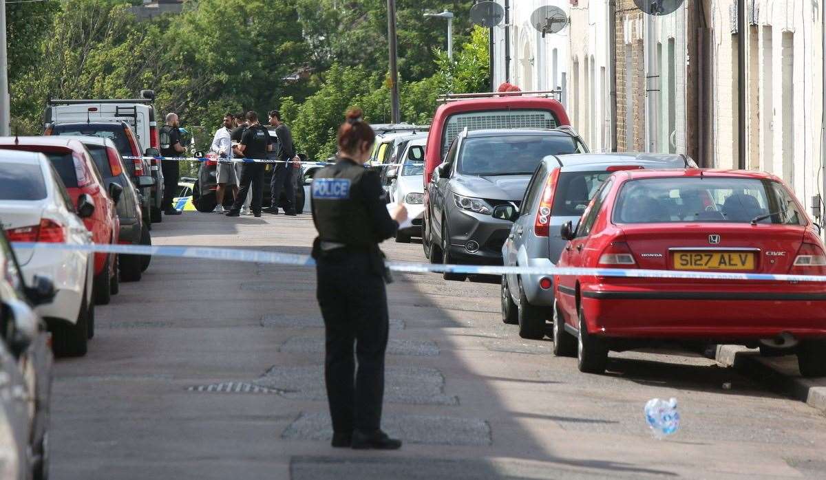 Investigation work takes place in Hartington Street after a man was stabbed. Picture: UKNiP