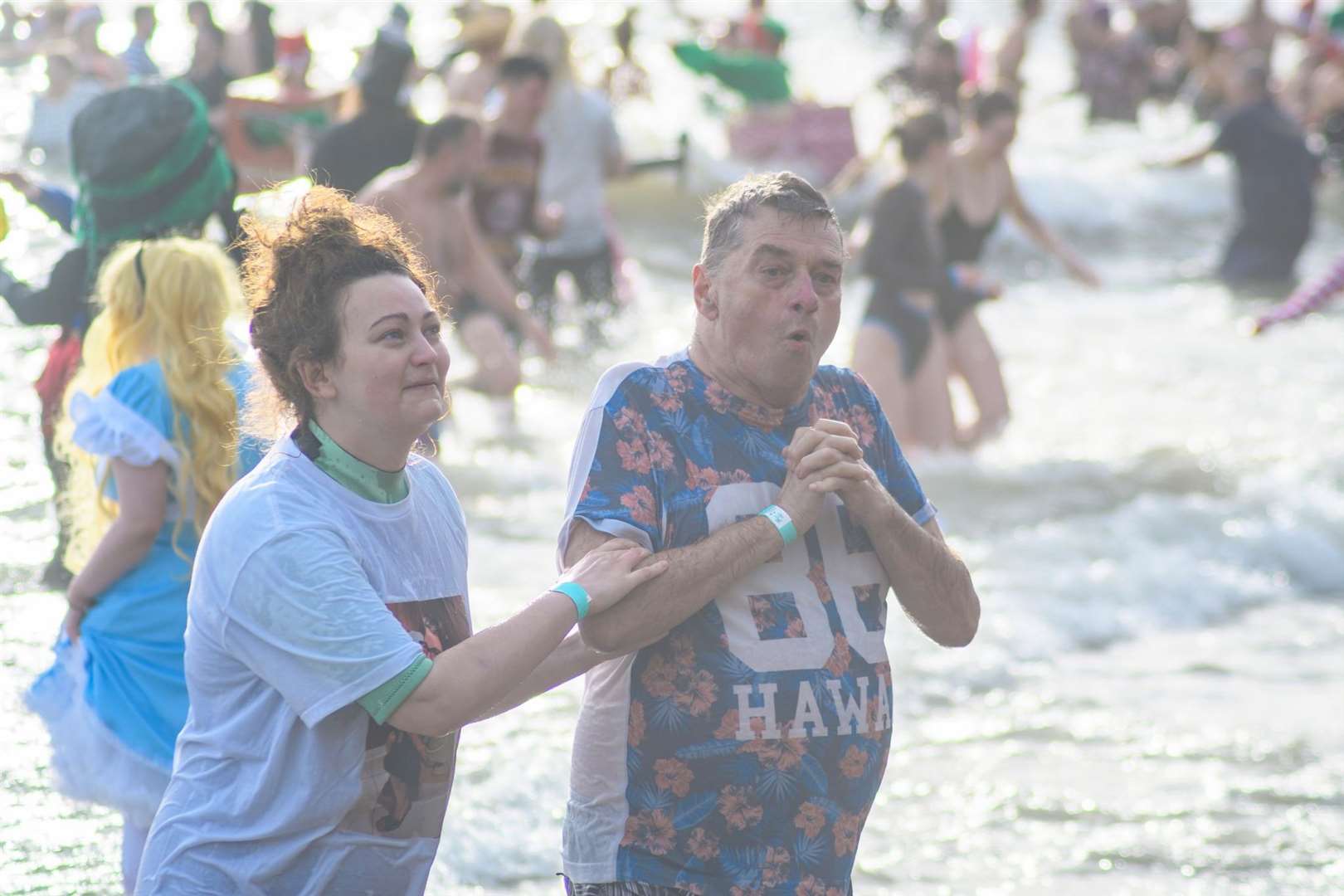 Cold enough for you? A freezing swim in the water at Folkestone. Picture: Shaun Ranger/Folkestone, Hythe and District Lions Club