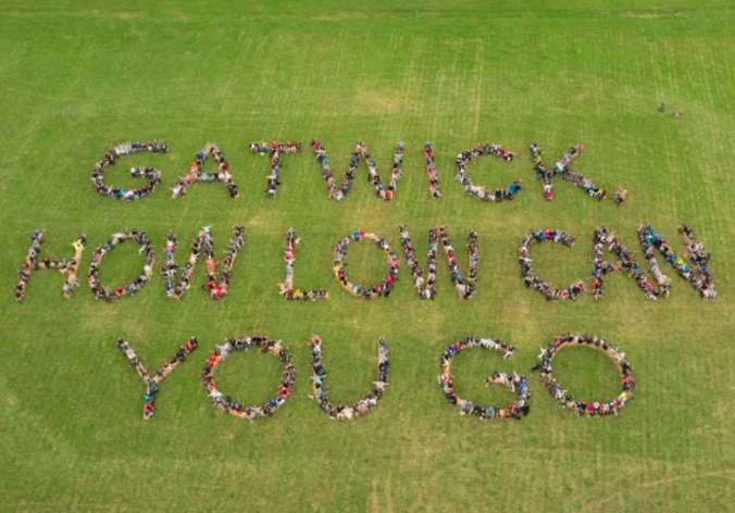 The 100ft sign created by hundreds of people protesting against the narrowing of flightpaths. Picture: Gatwick Obviously Not