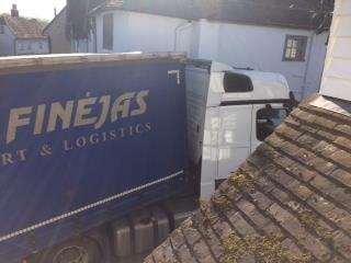 The lorry attemps the turn into the narrow lane (1876329)