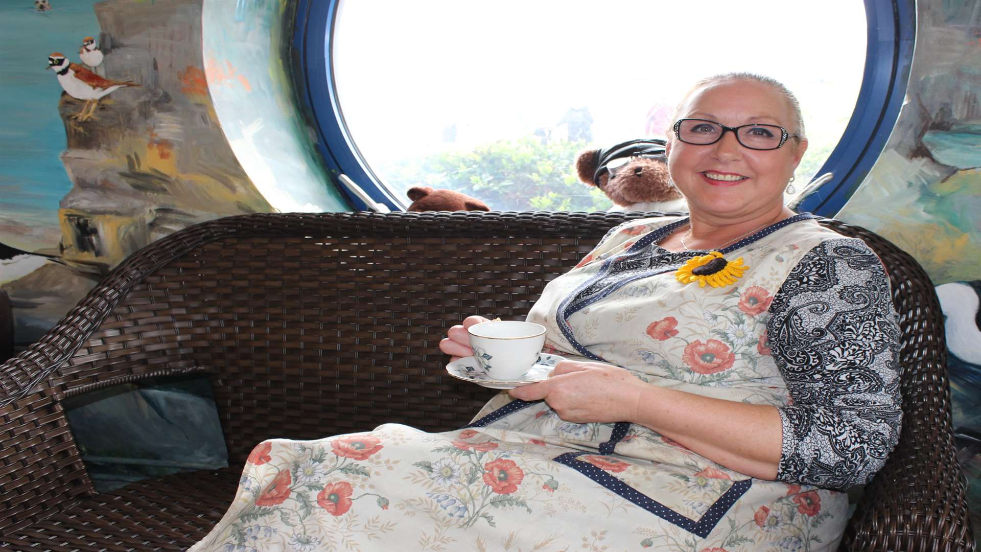 Taking a rest: Maggie Laidlaw at the cafe's "porthole".