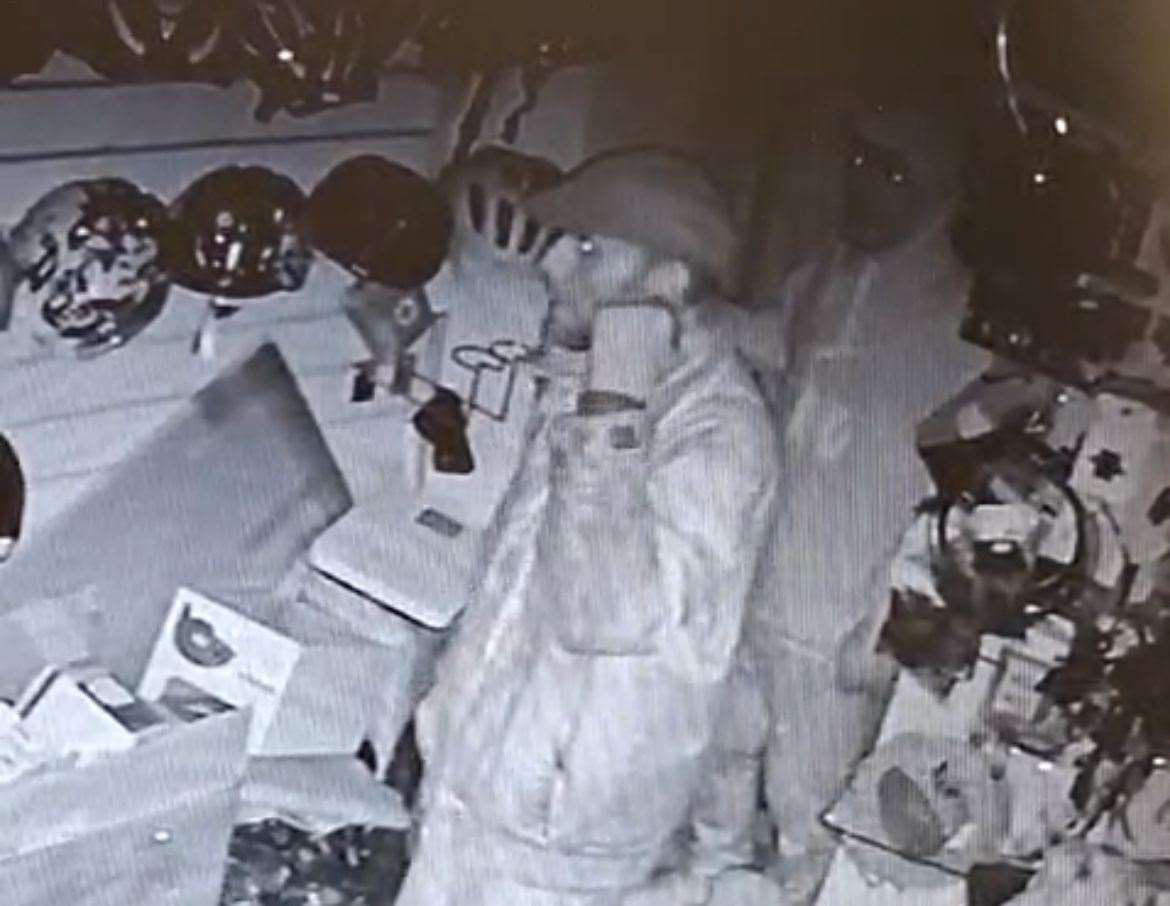 CCTV footage has been released showing two men inside the store