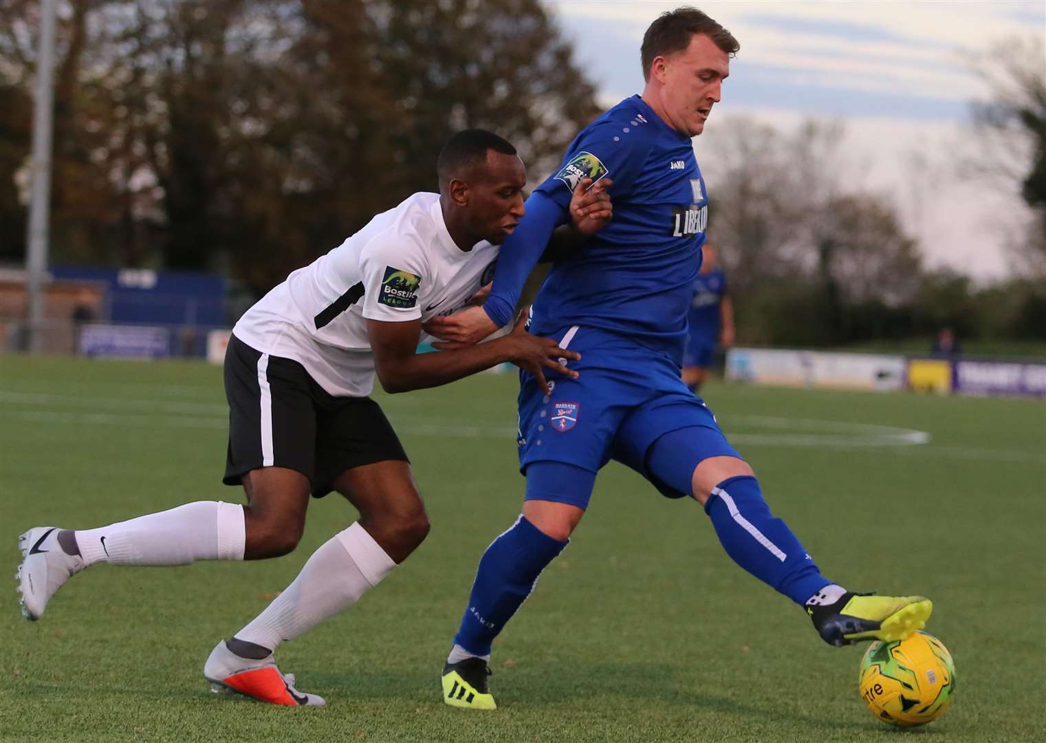 Margate's Alex Flisher holds off Burgess Hill defender Ibrahim Diallo Picture: Don Walker