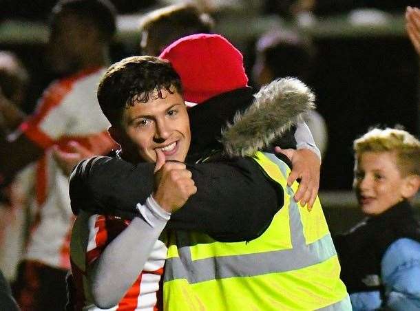 Defender Frankie Morgan gives the thumbs-up as he is embraced as Sheppey seal their FA Cup First-Round place last year. Picture: Marc Richards