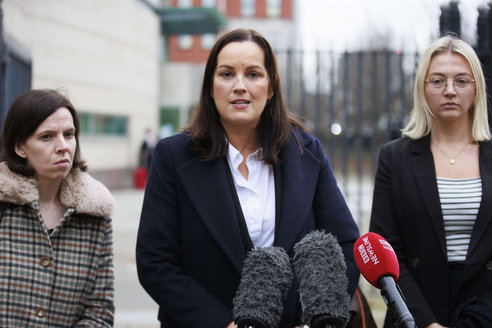 Helena Dallat O’Driscoll, Phoenix Law solicitor Claire McKeegan and her colleague Shanagh McAllister (Liam McBurney/PA)