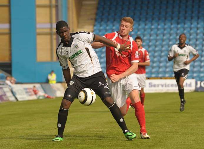 Michael Kamara holds off Alex Osborn Picture: Steve Crispe