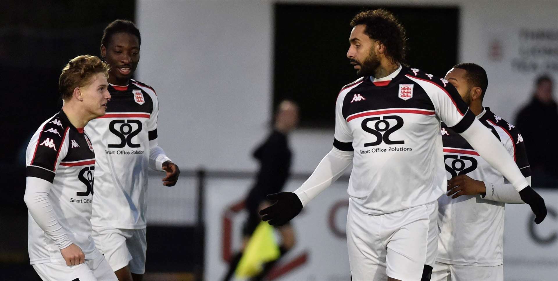 Stefan Payne celebrates against VCD with team-mates Kieron Campbell, Nathan Wood and Rahman Kareem during Faversham’s 2-0 weekend win. Picture: Ian Scammell