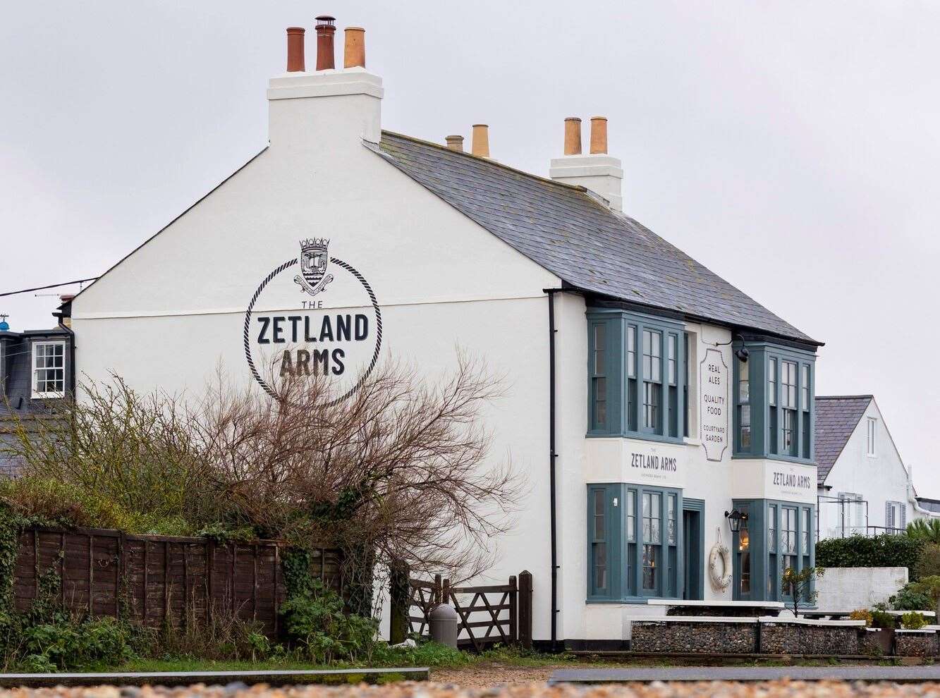 The existing beach huts are close to The Zetland Arms pub; Dover District Council is yet to reveal exactly where it plans to install the new huts. Picture: Shepherd Neame