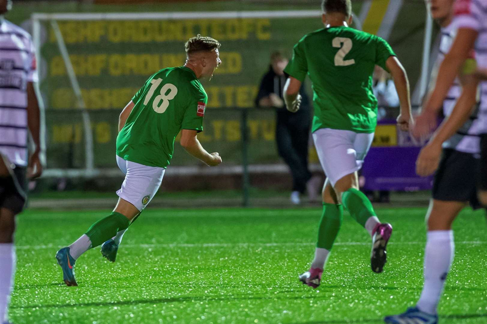 Jack Saunders (No.18) celebrates his late equaliser for Ashford against Margate. Picture: Ian Scammell