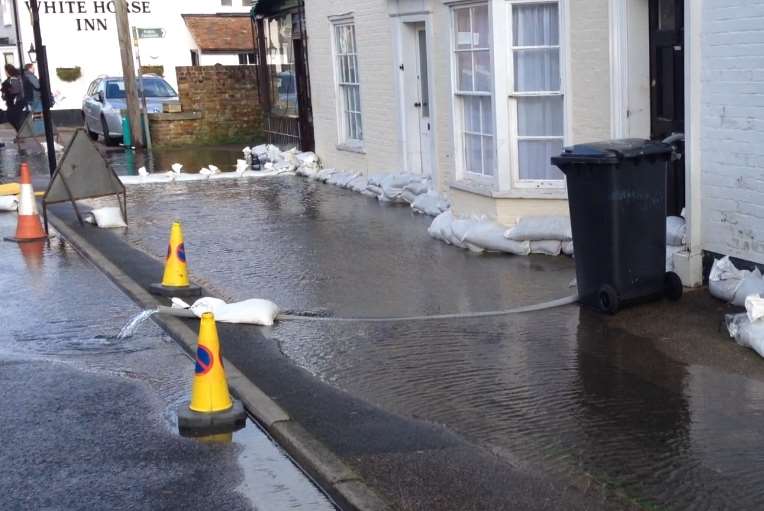 Floodwater creeping up to homes in Bridge